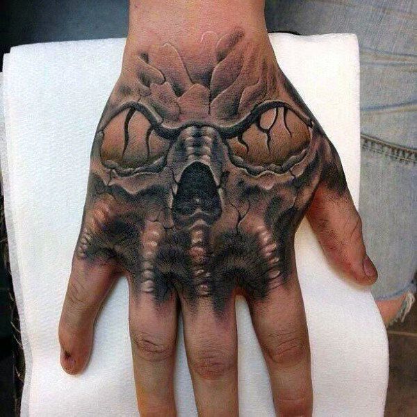 50 Skull Hand Tattoo Designs With Meaning Art And Design