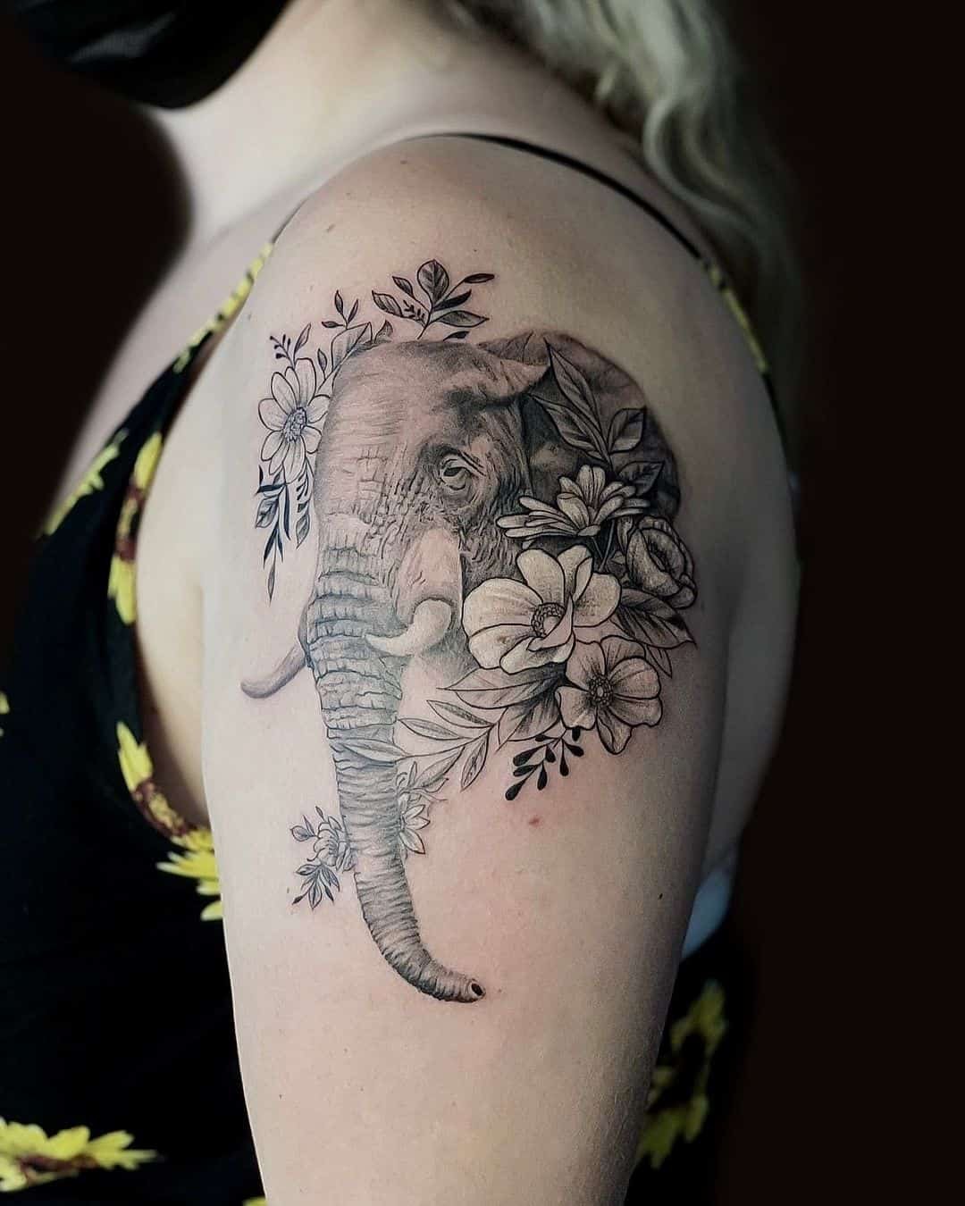 Aggregate More Than 77 Elephant Tattoos With Flowers In Cdgdbentre