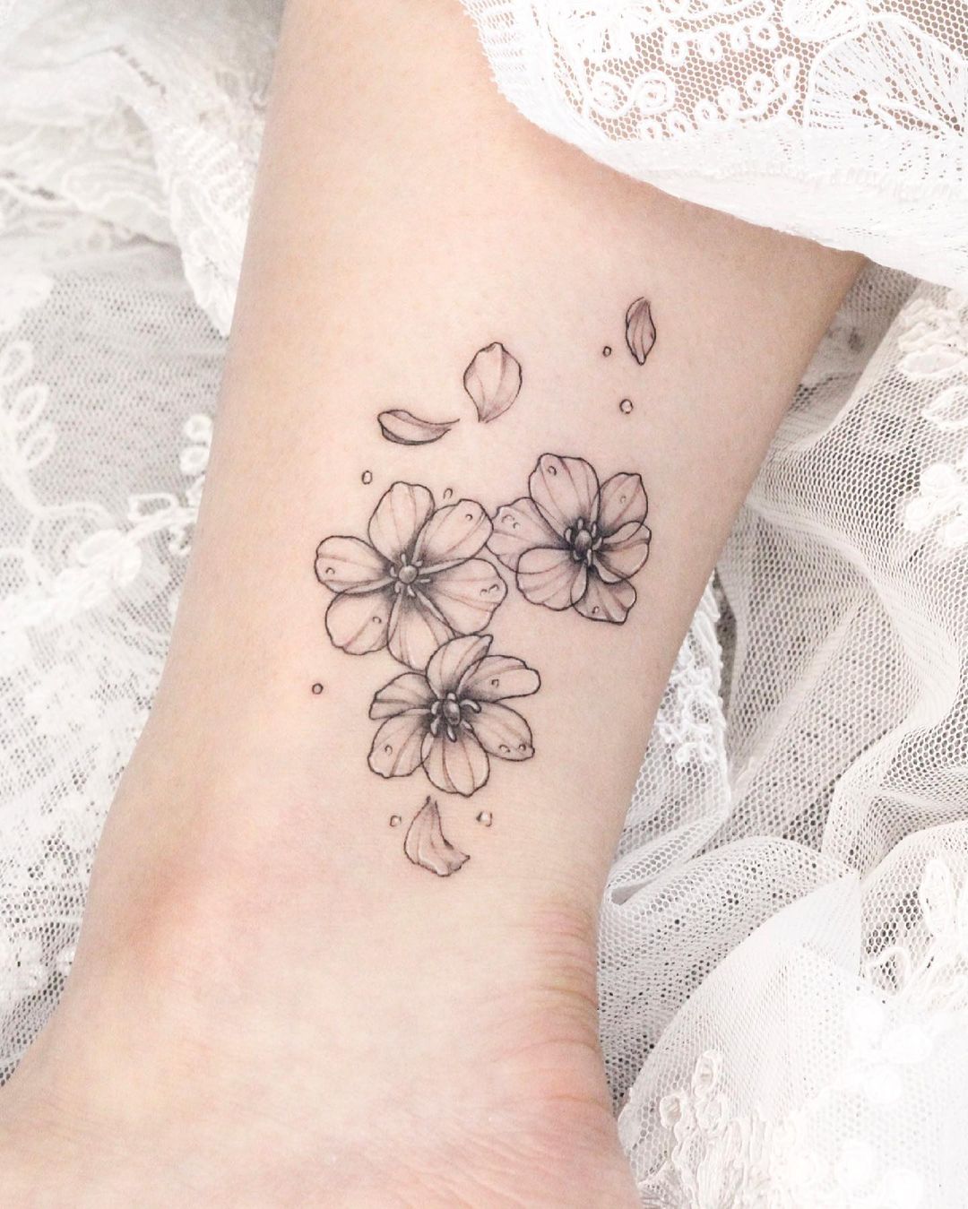 Aggregate More Than 80 4 Petal Flower Tattoo Latest Vova Edu Vn