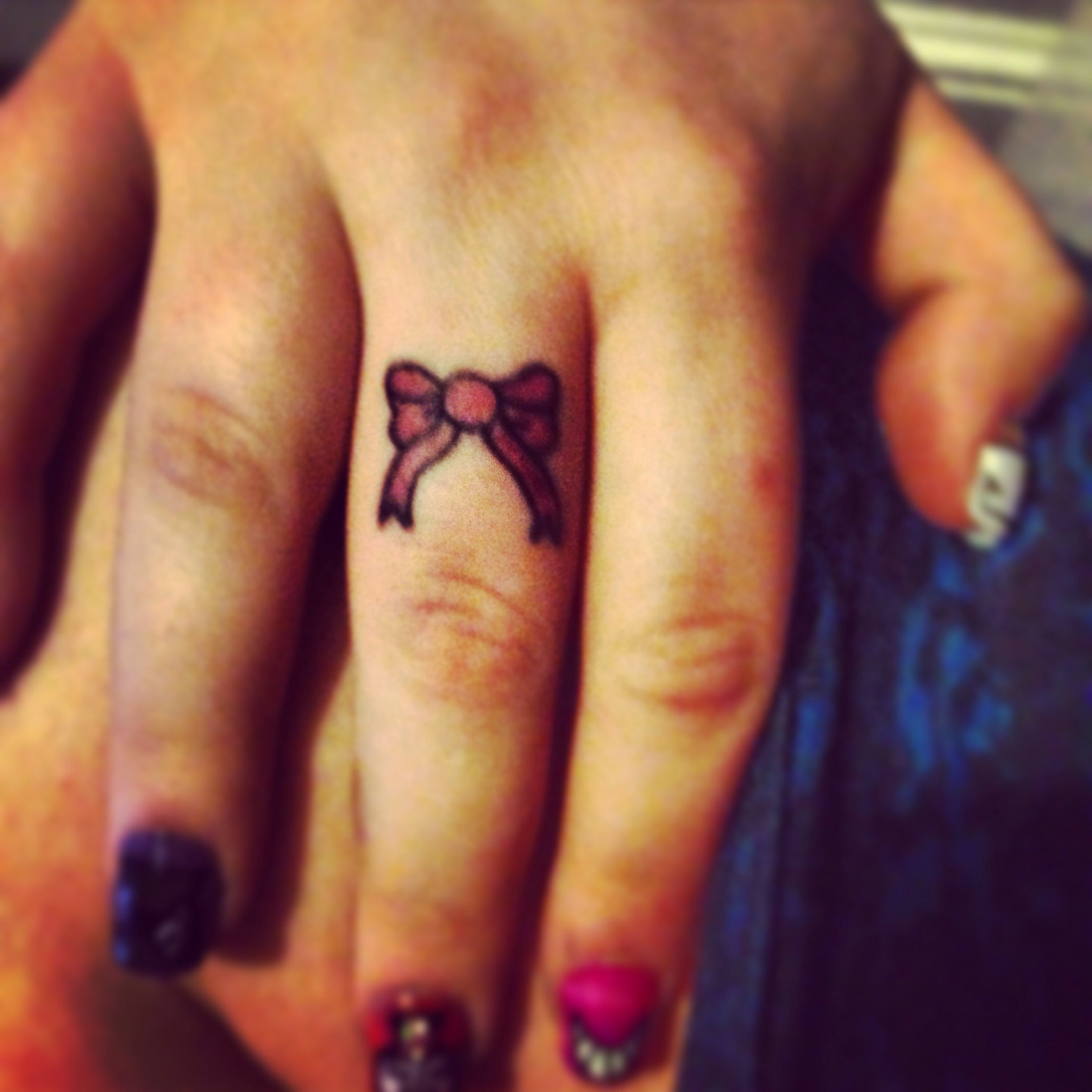 Bow Tattoo Finger