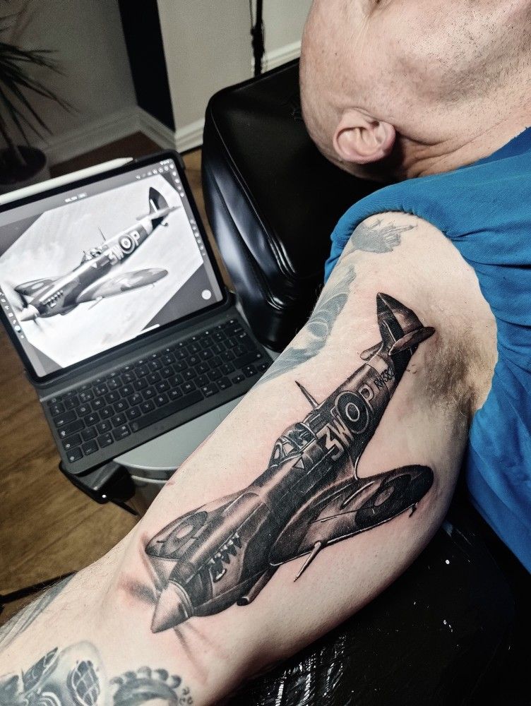 Colorful Spitfire Tattoo On Right Half Sleeve