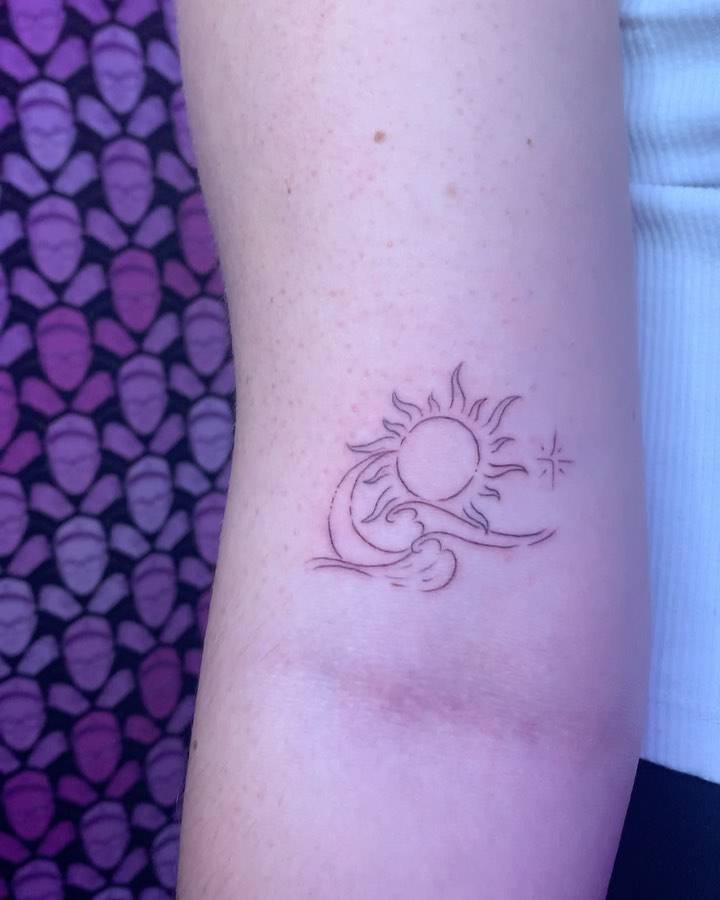 Fine Line Sun Moon And Wave Tattoo On The Bicep