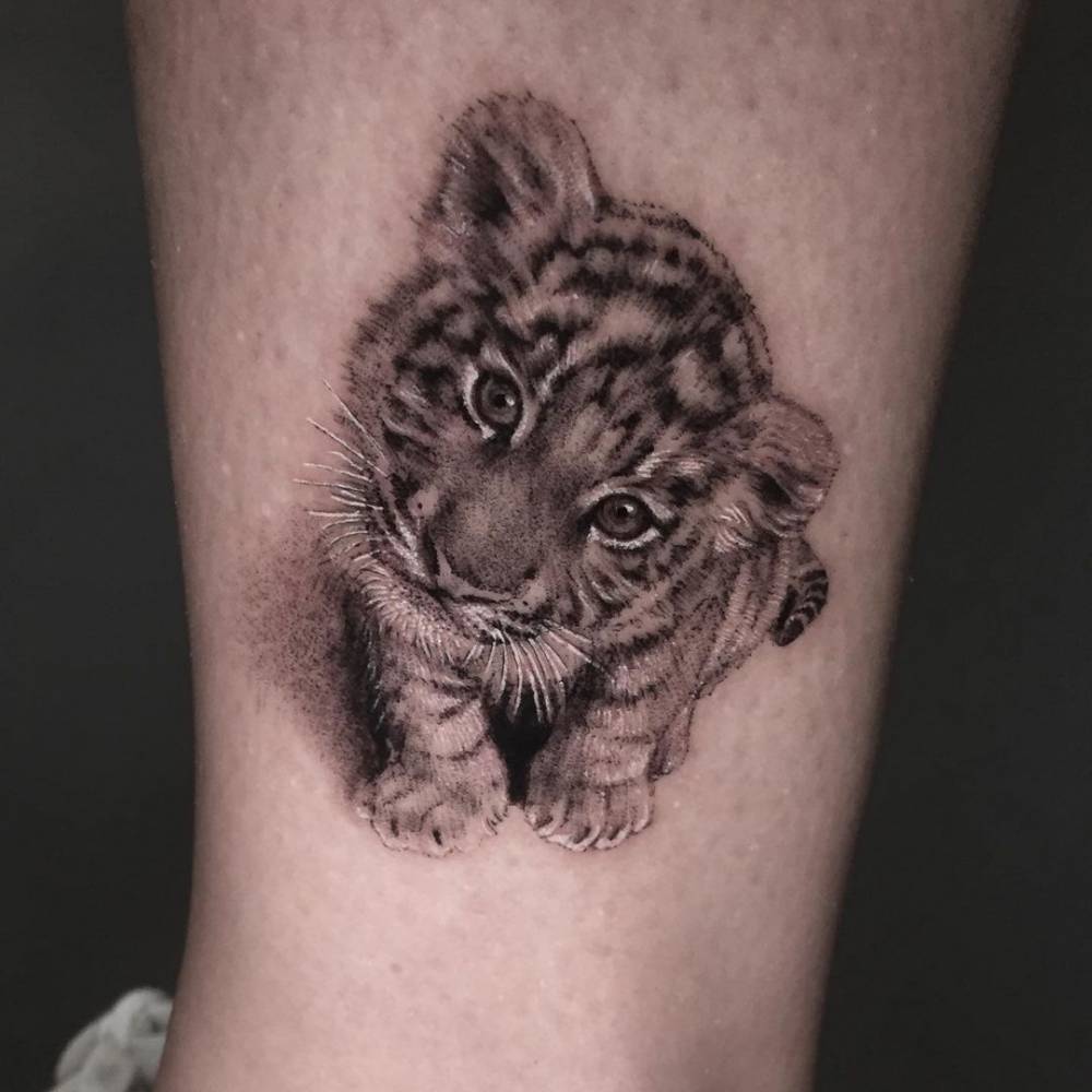 Micro Realistic Tiger Cub Tattoo On The Ankle