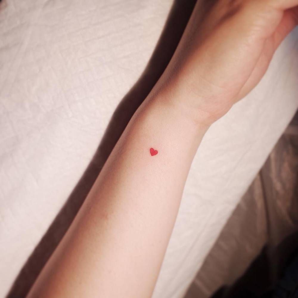 Minimalist Finger Heart Tattoo On The Wrist