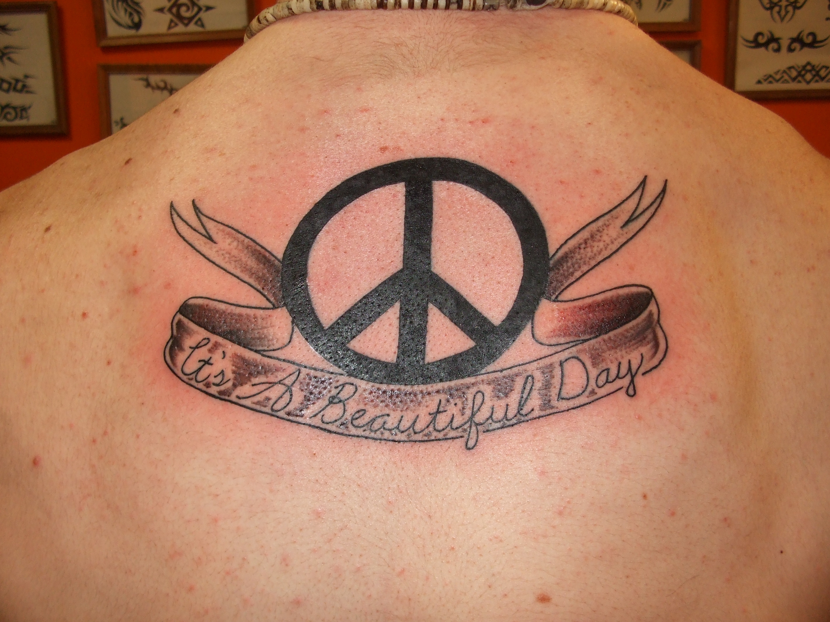 Peace Symbol Tattoos What Do They Mean Peace Sign Tattoo Designs