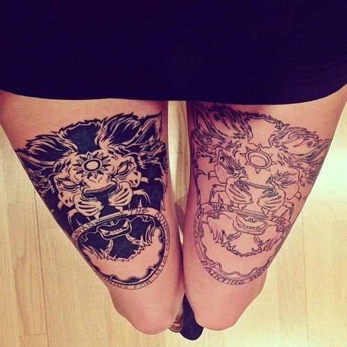 25 Pretty Thigh Tattoo Designs for Bold Statements