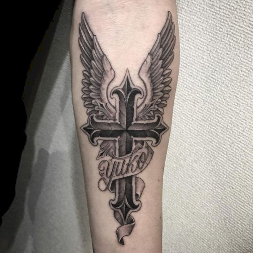 7 Stunning Roman Catholic Cross Tattoo Designs