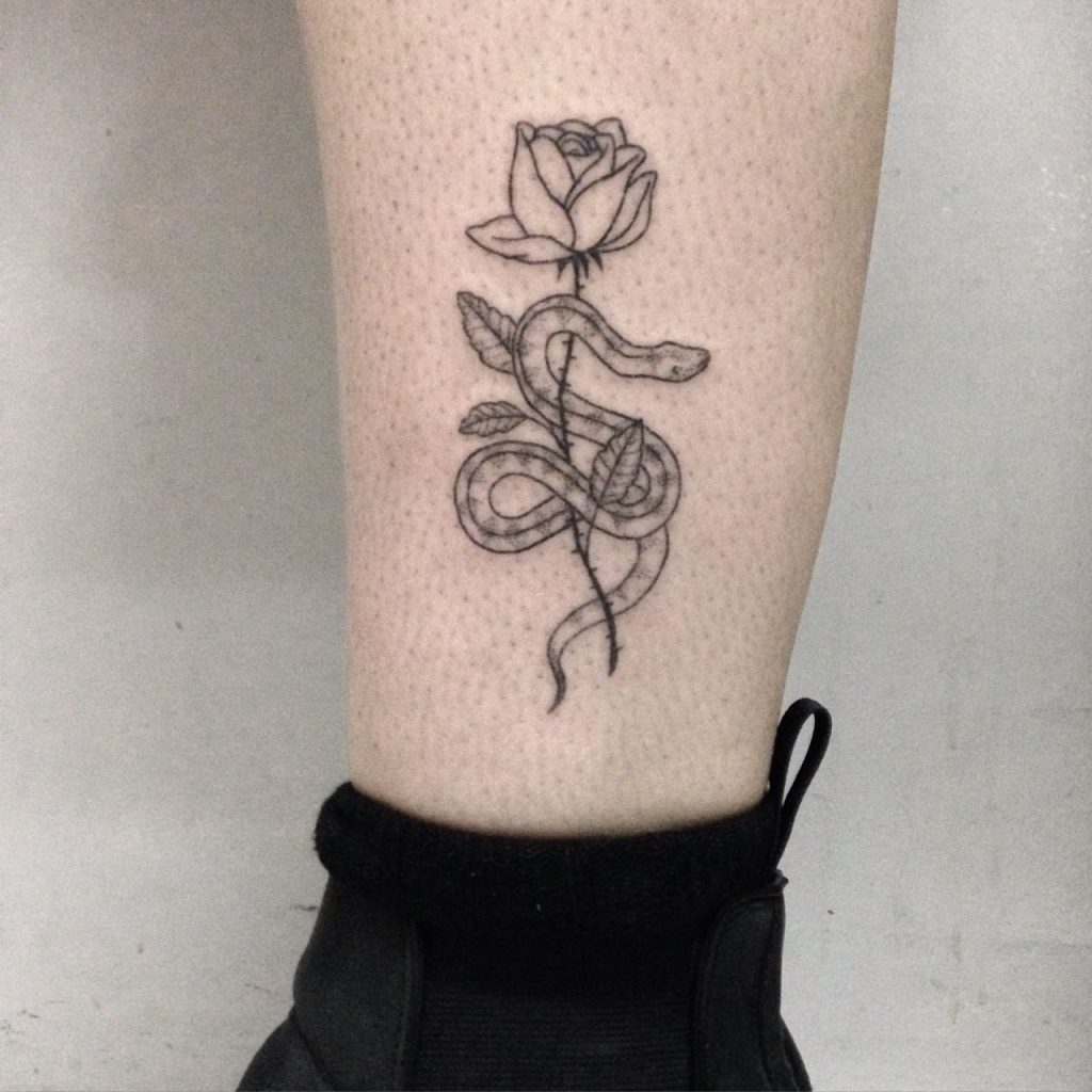 Rose and Snake Tattoo Design: Elegant Ink Ideas