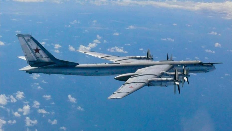 Russian Air Force Strategic Bomber Tu 160 Accompanied By A Fighter Jet