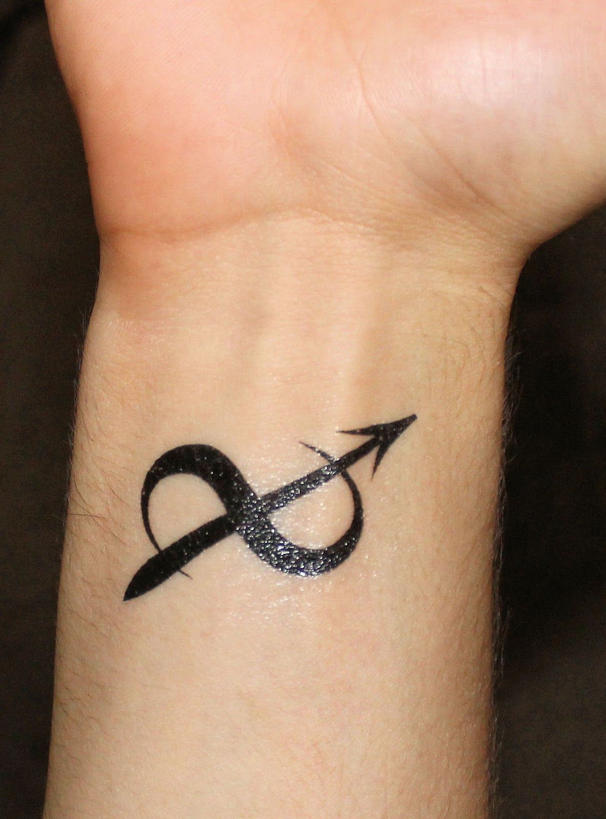 7 Stunning Sagittarius Symbol Tattoo Designs for Inspiration