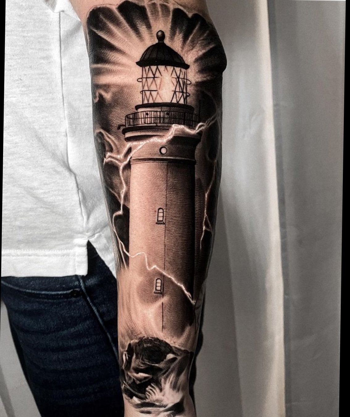 Simple Lighthouse Tattoo Designs: Elegant and Symbolic