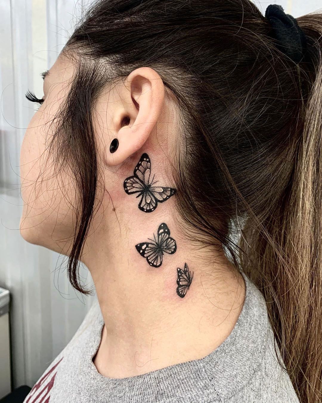 15 Small Neck Tattoos Every Woman Should Consider