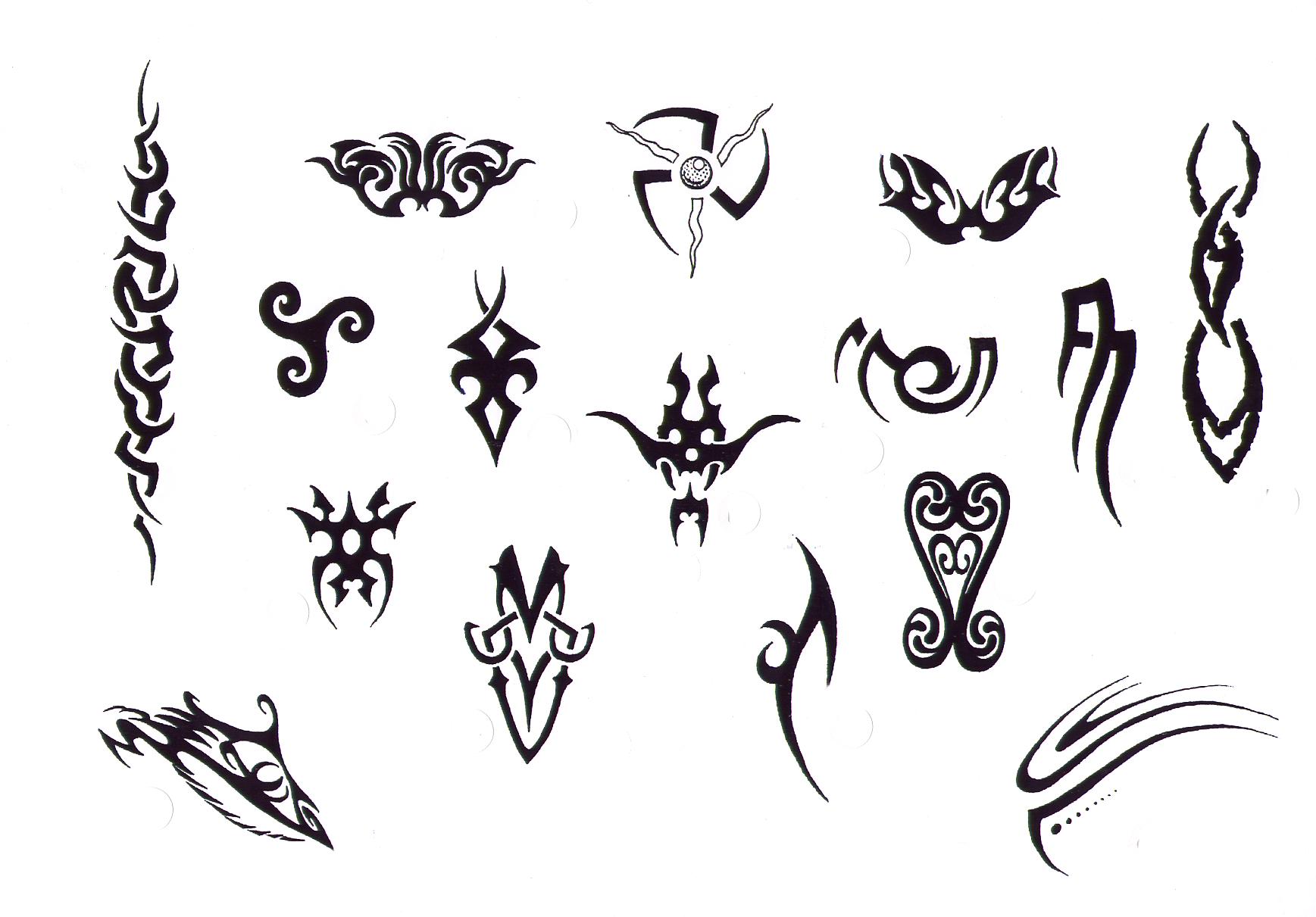 Some Tattoos That Are Drawn On Paper