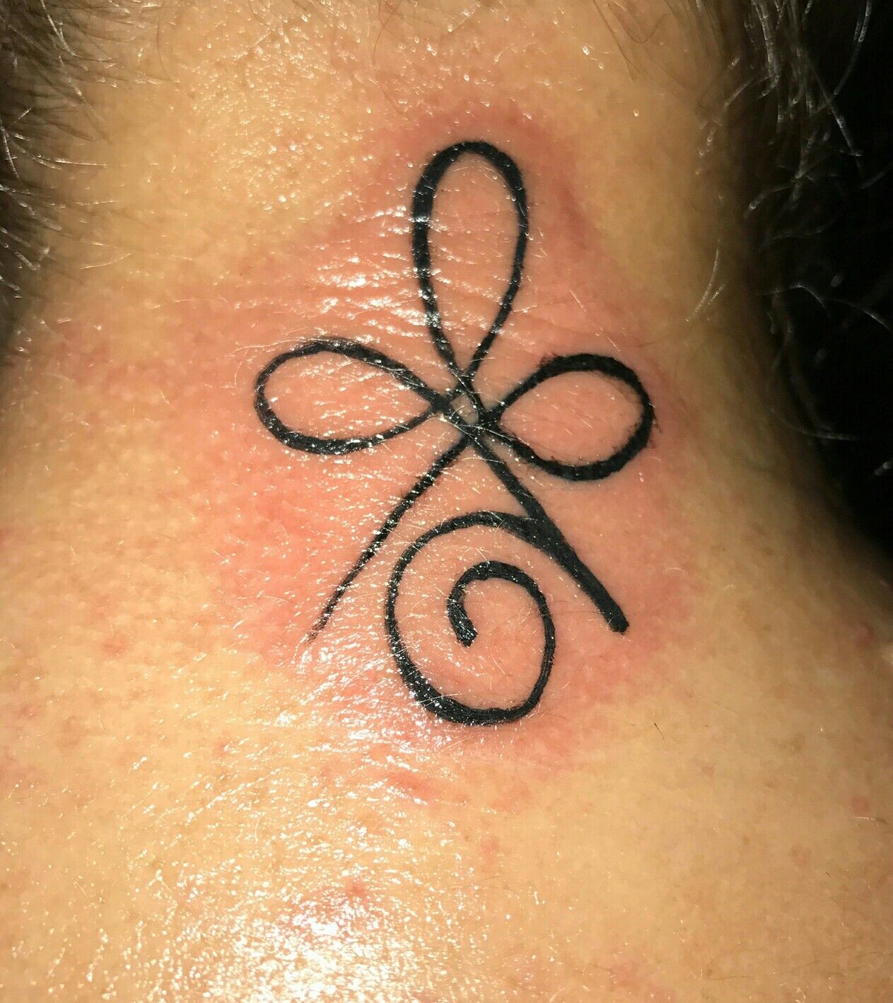 Strength Symbol Tattoo