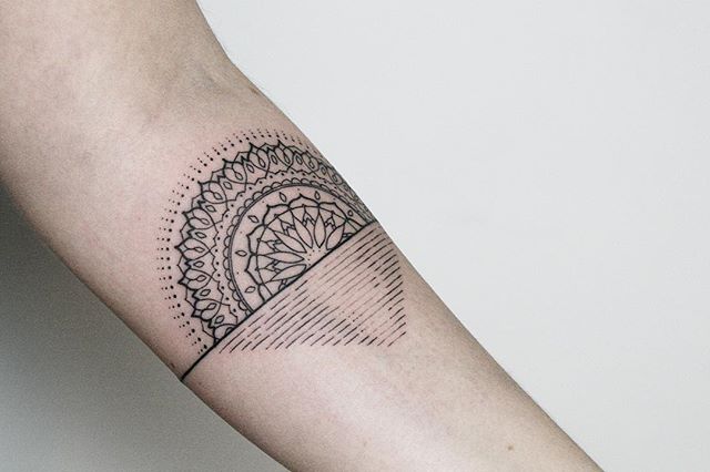 Stylized Sun Tattoo