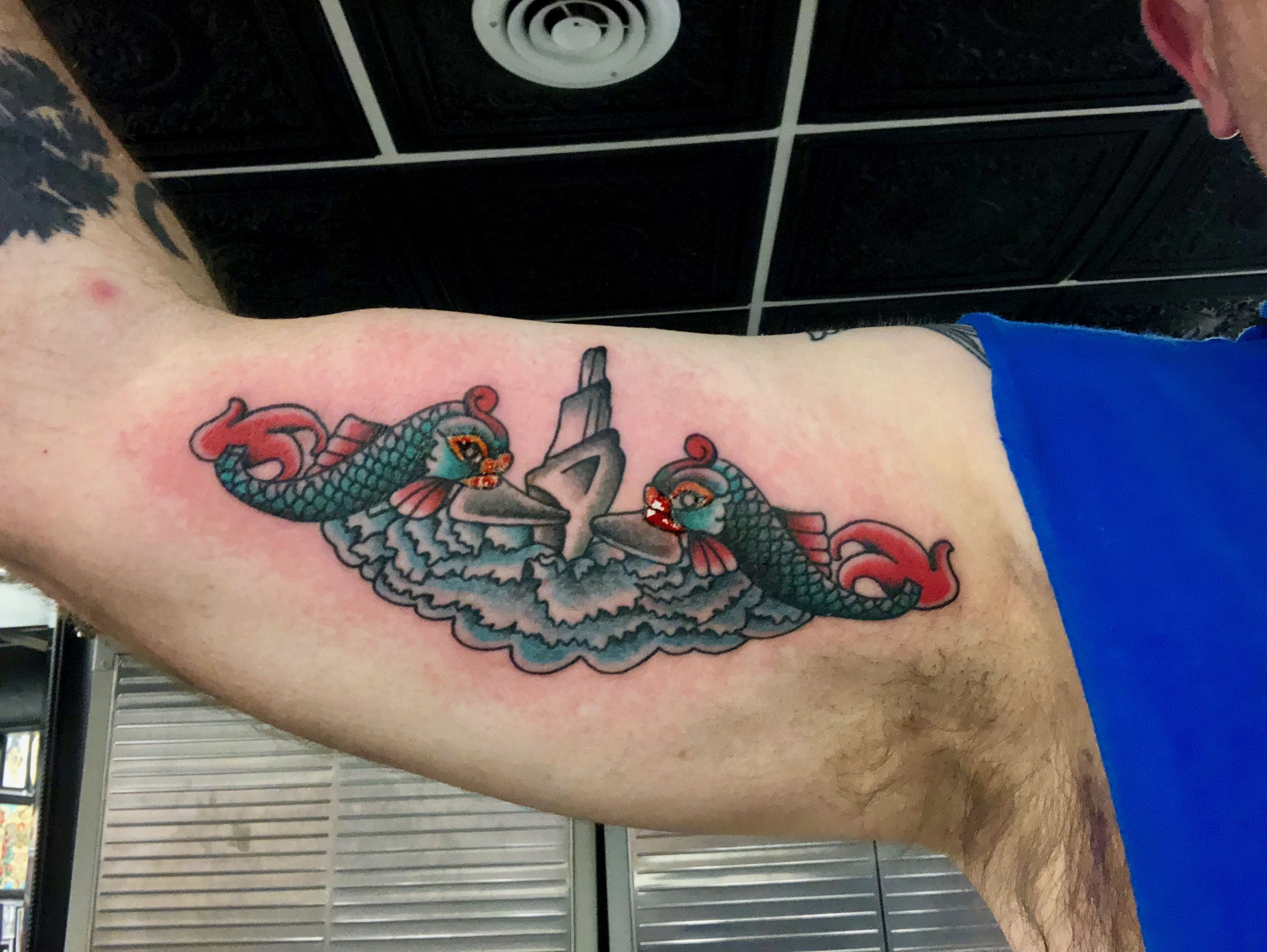 Submarine Dolphins Tattoo