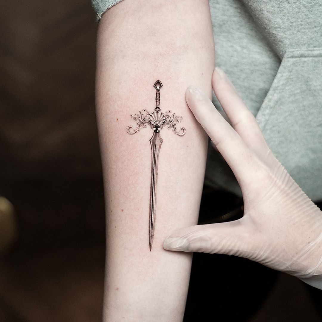 Sword Tattoo Designs for Women: Elegant and Empowering Ink Ideas