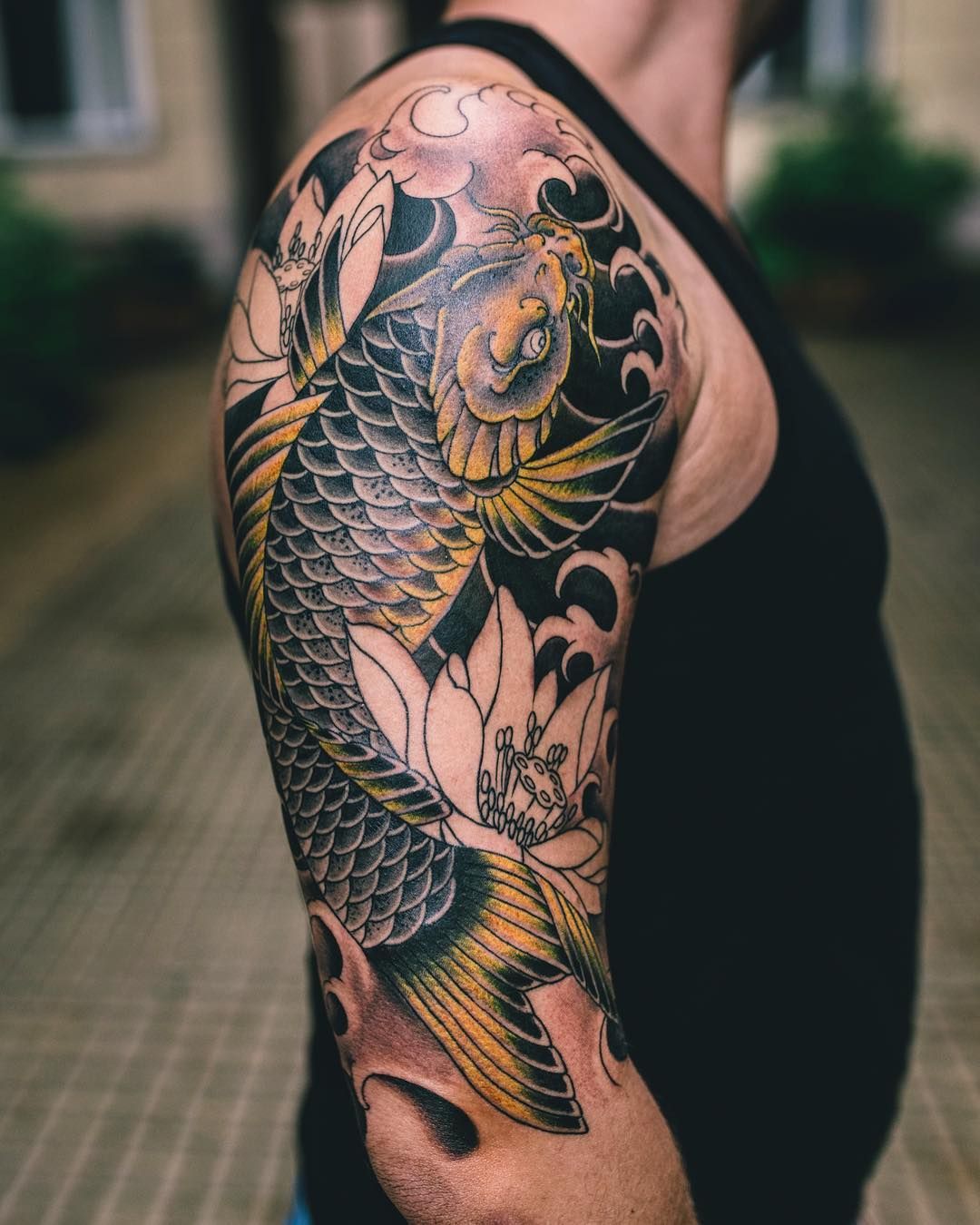 7 Symbolic Meanings Behind Koi Fish Tattoos