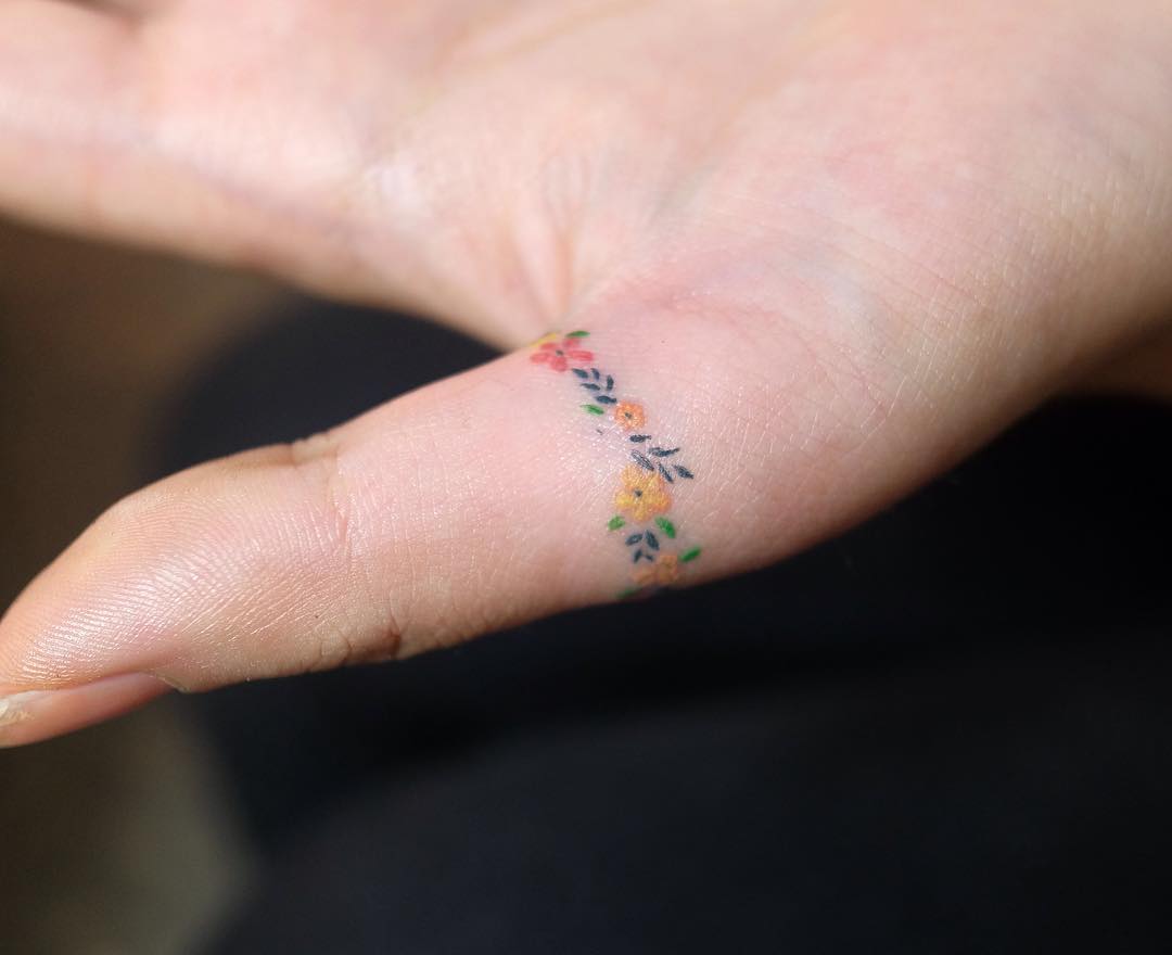 15 Thumb Ring Tattoo Designs for Modern Rebels